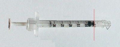 Needle bent; entire dose remains in syringe