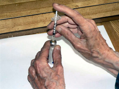Inject air into the vial